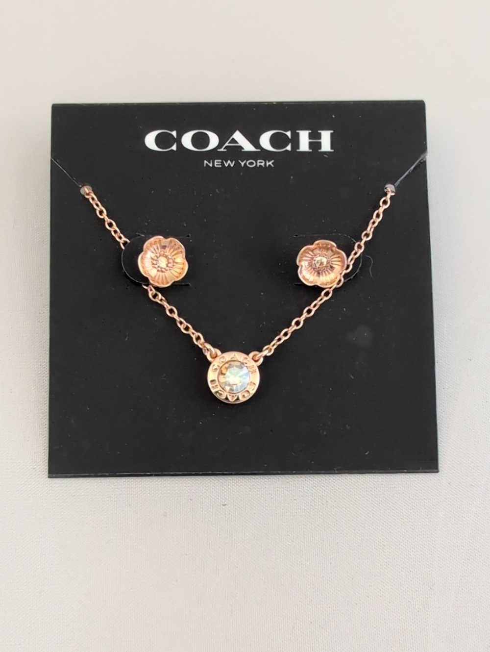 Coach Rose Gold Floral Pendant Necklace with Crystal Accent